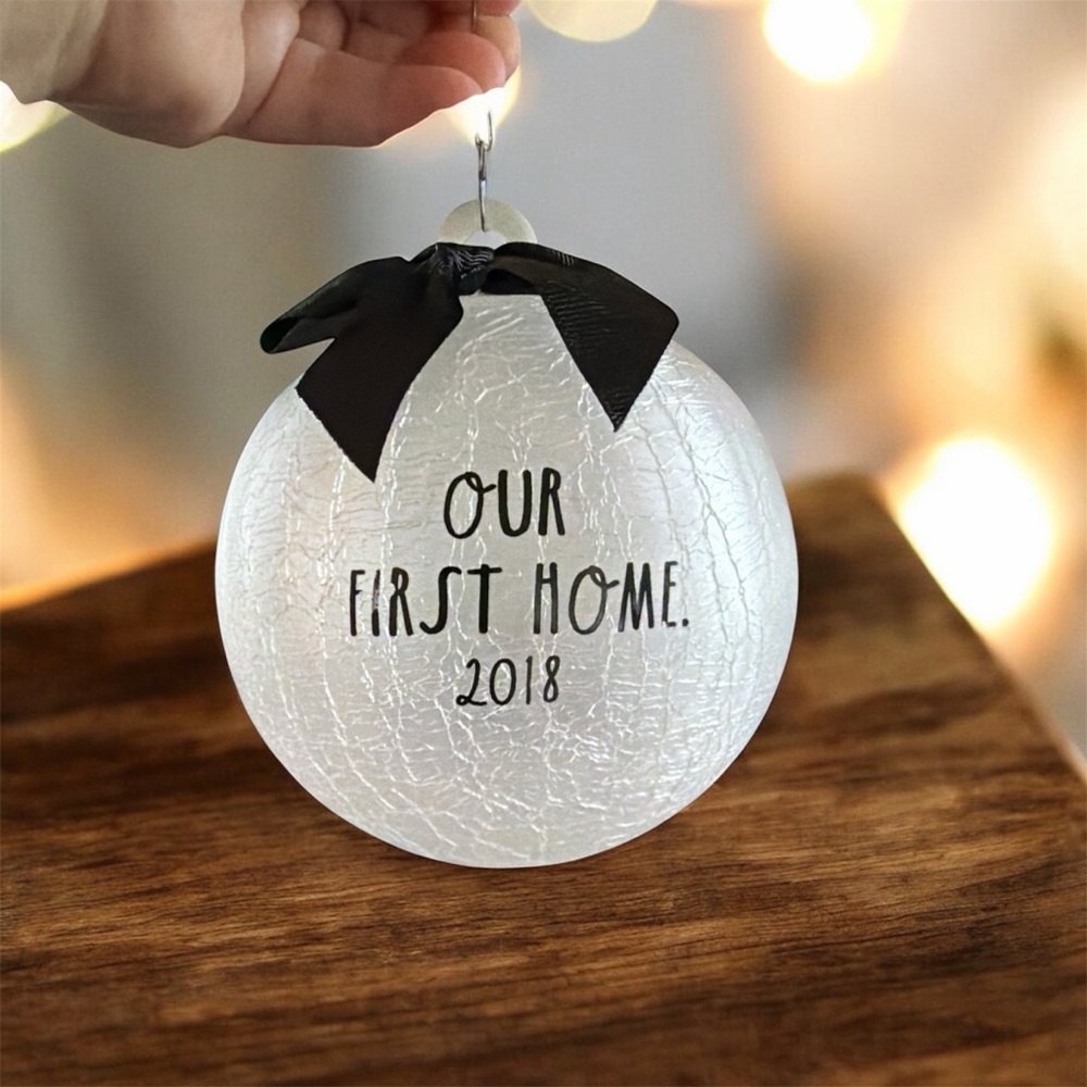 Rae Dunn- “Our First Home 2018” White Holiday Ornament with Black Bow